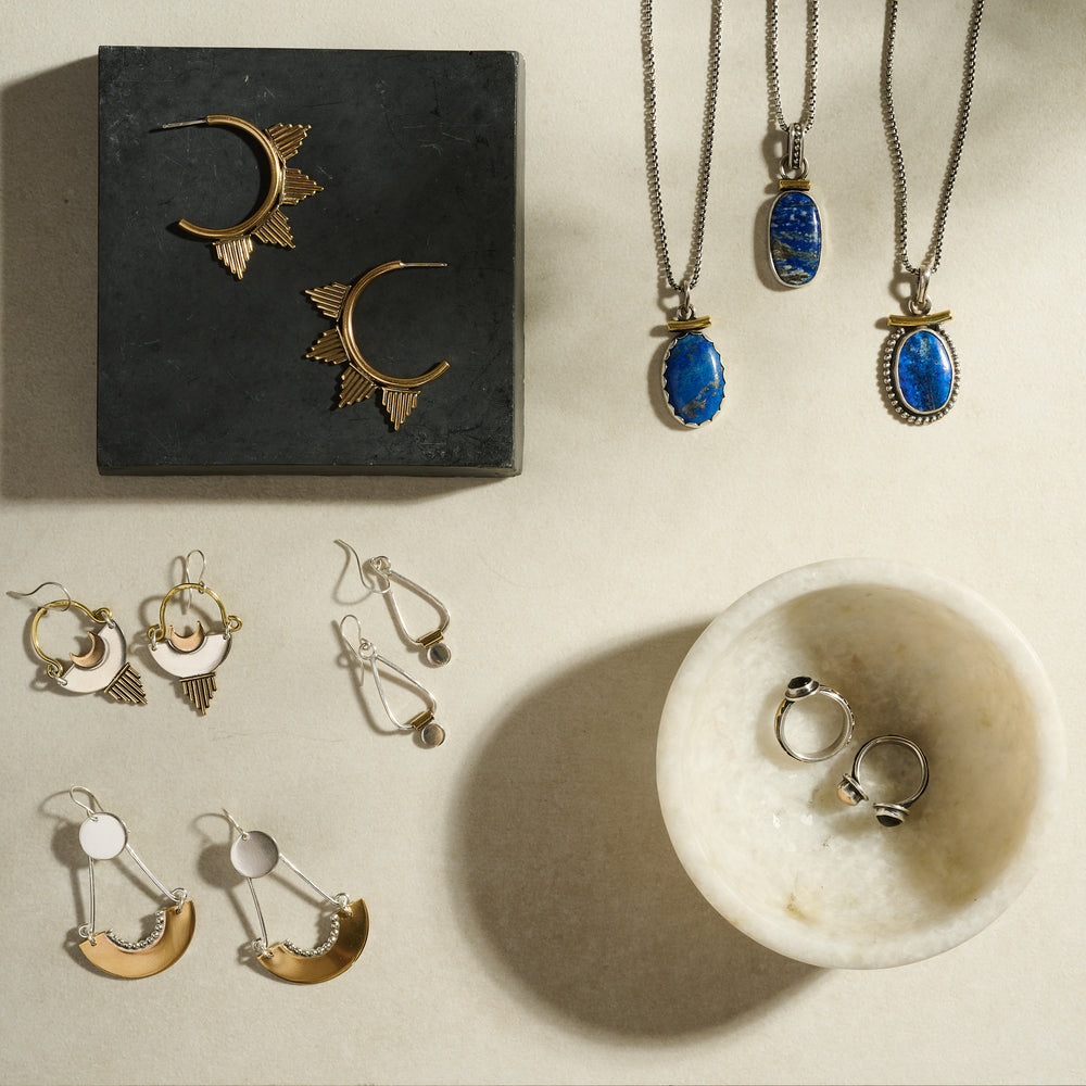 
                      
                        Athena Earrings | Silver + Brass
                      
                    