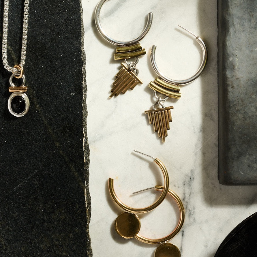 
                      
                        Solar Flare Earrings | Silver + Brass
                      
                    