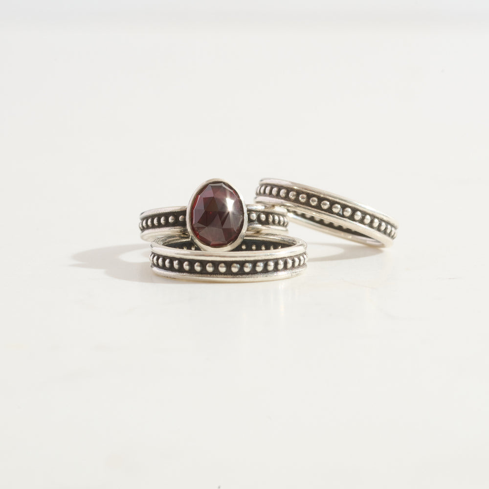 
                      
                        Garnet Protection Stacking Ring Trio | Silver
                      
                    